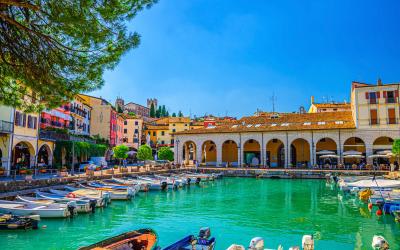 Old harbour Porto Vecchio with motor boats on turquoise water