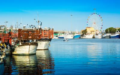 Pescara river whit boat, city in the middle of italy