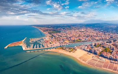 Colorful summer view from flying drone Pescara port.