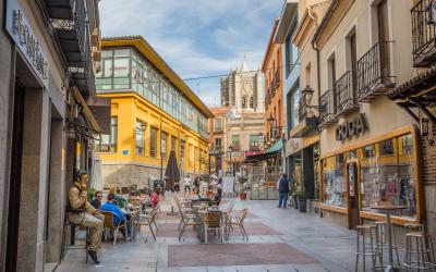 iew of one street with open air cafe in historic center of Avila Spain.