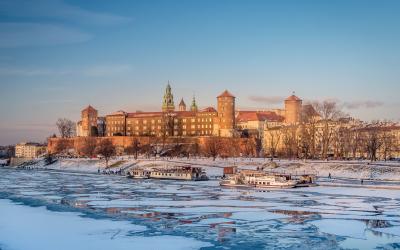 Royal Wawel Castle in winter time with ice floe on the Vistula river, Krakow