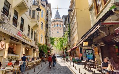 Galata Tower from an old narrow street. Istanbul
