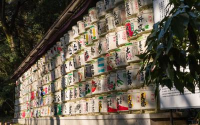 Wall of decorative sake barrels offered at Meiji Jingu Shrine in Tokyo, Japan