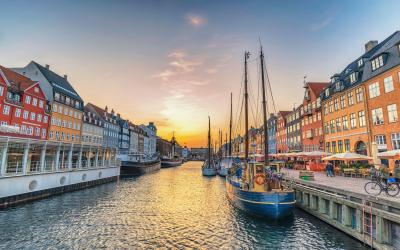 Copenhagen Denmark, sunset city skyline at Nyhavn harbour with colourful house