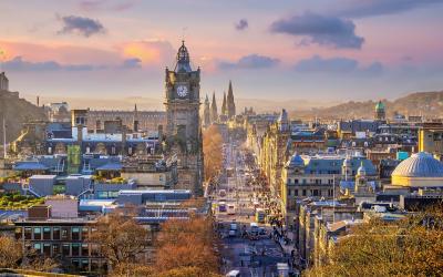 Old town Edinburgh city skyline. Cityscape in Scotland at sunset
