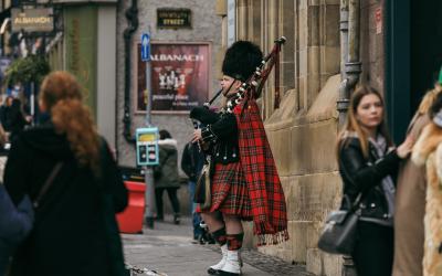 Edinburgh, Scotland, United Kingdom   Bagpiper performing on the streets